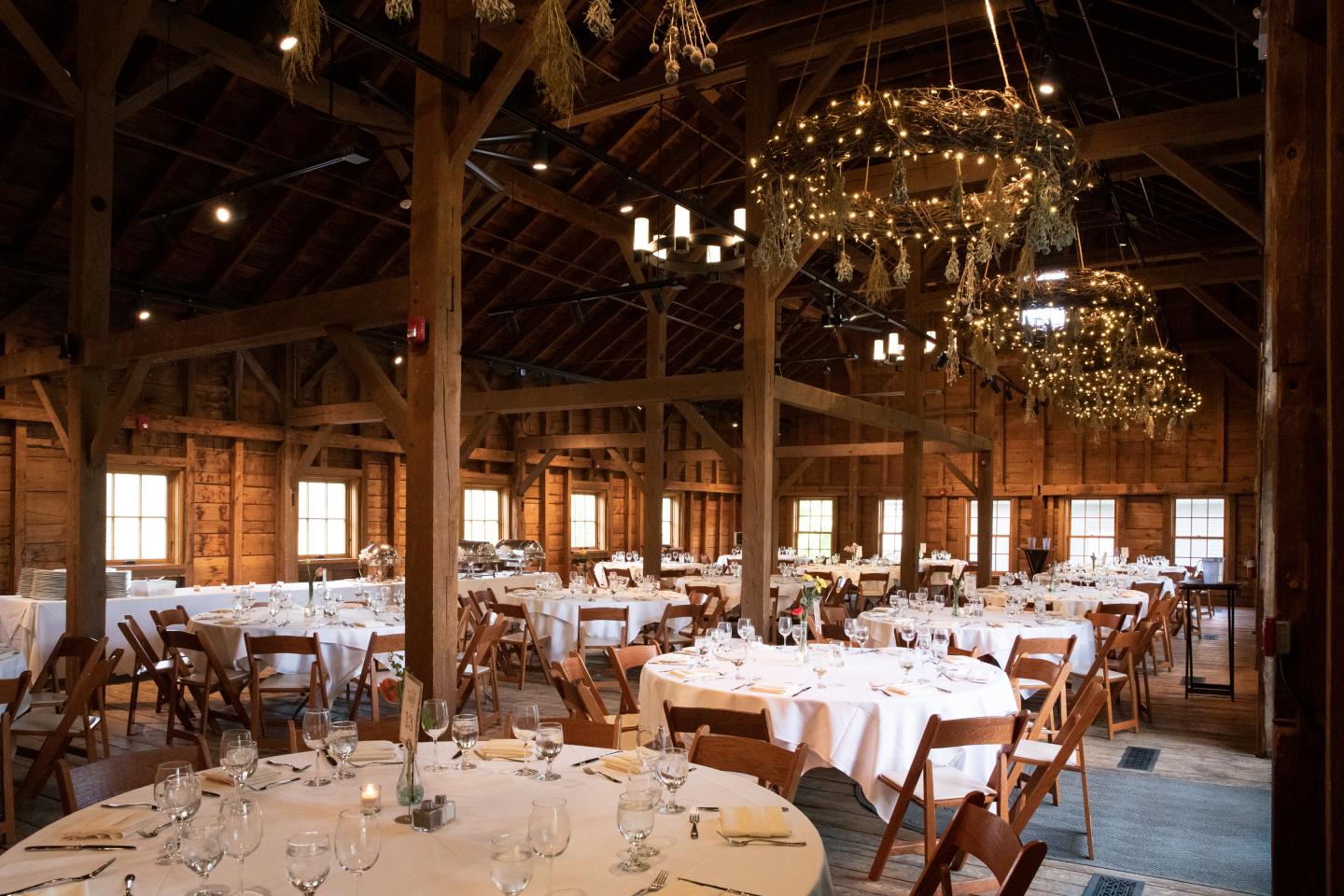Billings Barn event space set with tables